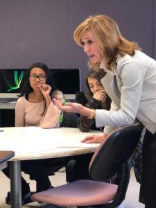 Linda Vester giving a lecture to Sissel McCarthy's students.