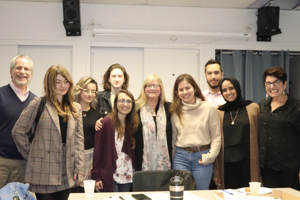 Award-winning reporter Susan Ferriss, at center, with Hunter College students and faculty, at an Oct. 29 luncheon. PHOTO: Crystal Rand