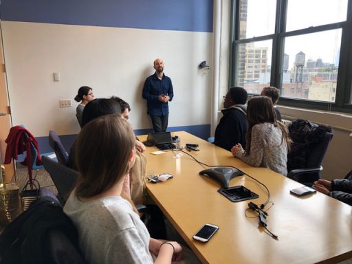 WNYC transit reporter Stephen Nessen (at center, left), hosted Hunter journalism students and Professor Sissel McCarthy (at center, right), discussing his beat and sharing tips on getting good vox pops.