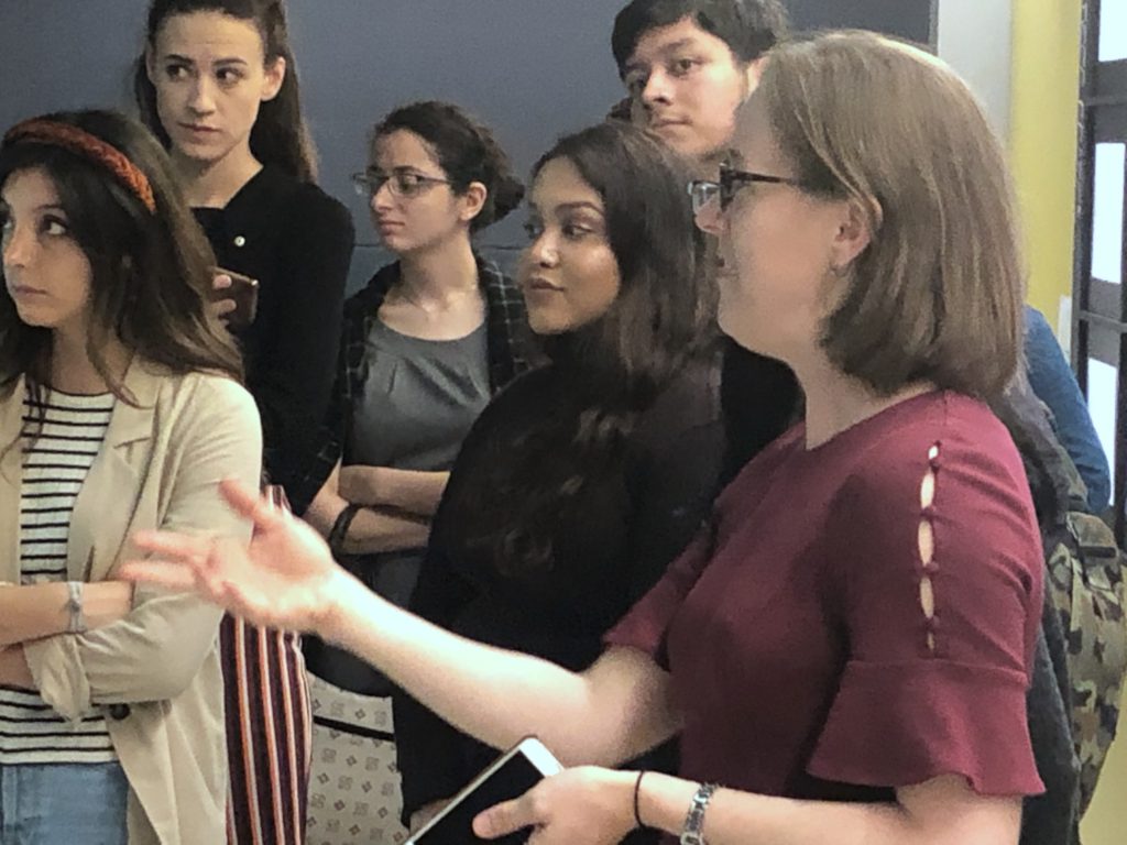 Wall Street Journal's Assistant Managing Editor Kate Ortega tours students from Katina Paron's Neighborhood News class through the news operations. PHOTO: Katina Paron