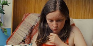 Screenshot for Jonny Come Lately with a woman looking down