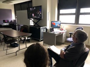 Shot of Siegel from behind in a 45 angle.